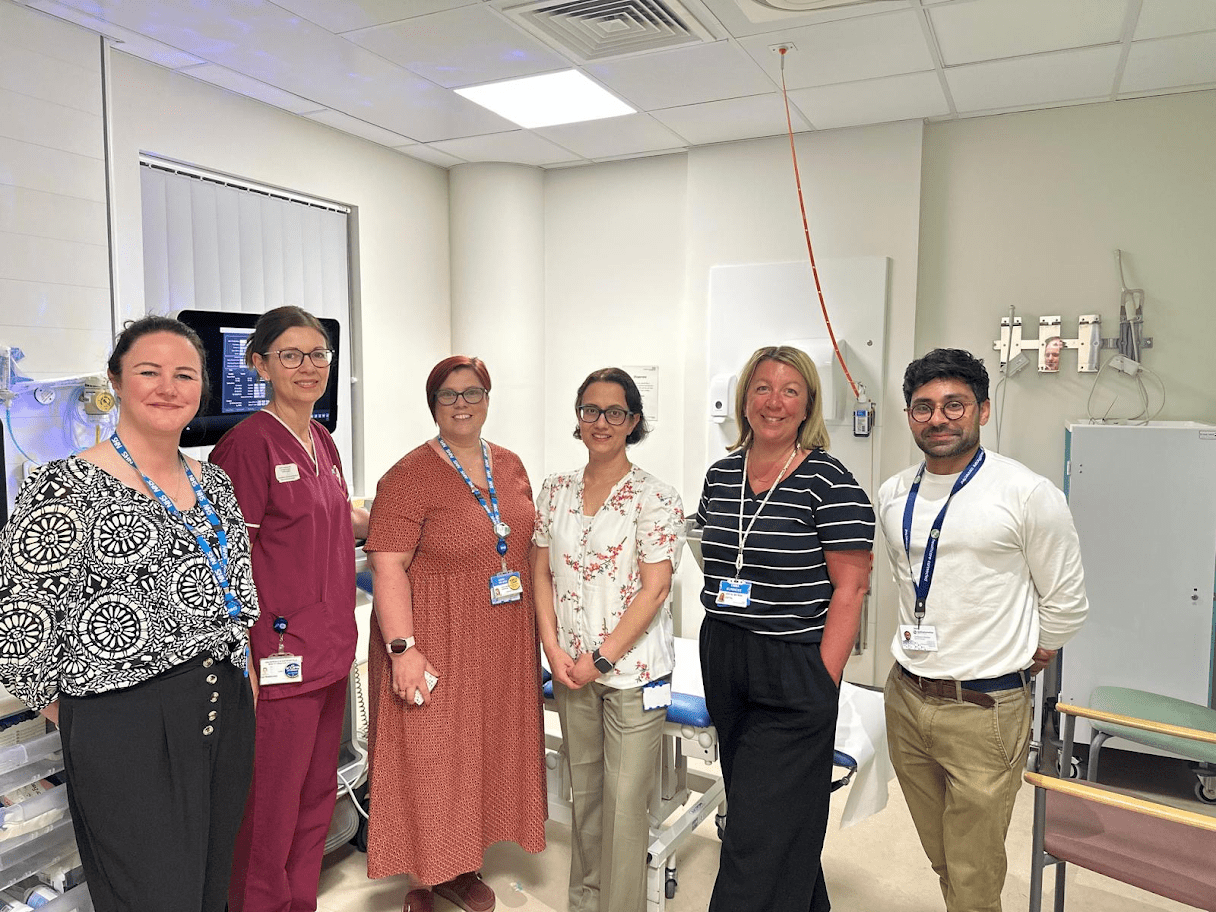 NHS staff stood in ultrasound room